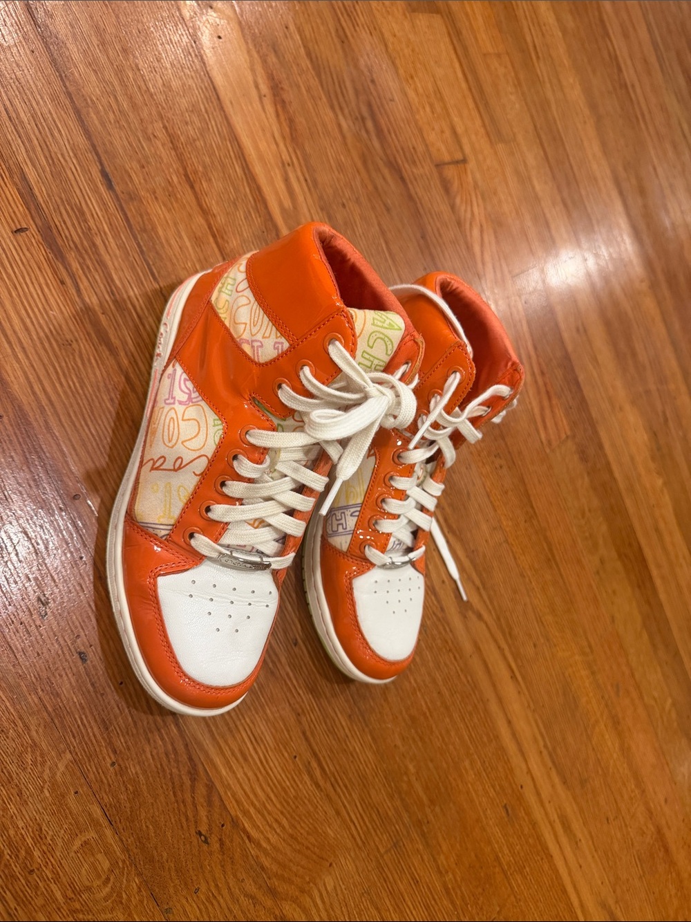 size 8.5Coach women’s Orange and WhiteTop Sneakers with Multicolor use no box